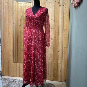 BCBGeneration red print wrap around dress. Shin length. Size 6 sheer sleeves.